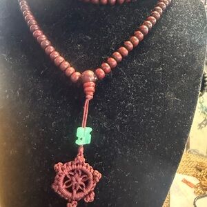 Handcrafted Burgundy Beaded Necklace with Green Jade Accent